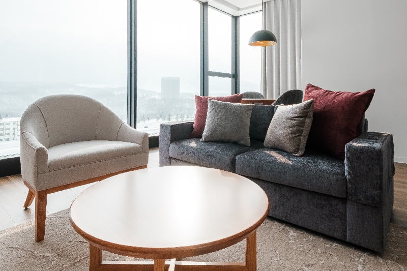 Spacious living room with large windows creates a sense of openness 